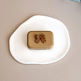 Estuche pequeño para lentes de contacto color té con leche