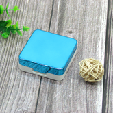 Estuche para lentes de contacto de color multicolor cuadrado galvanizado